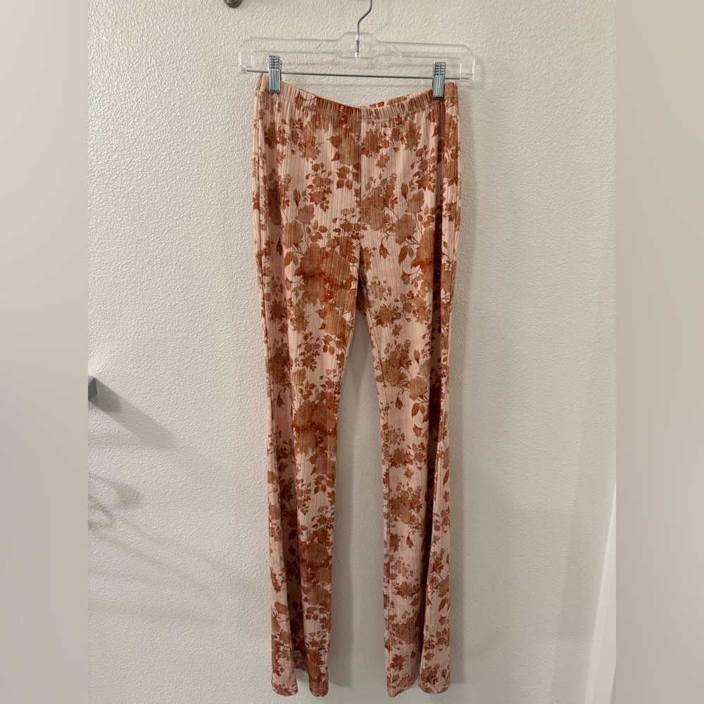 Adika size Medium floral pants. Stretchy material. Textured. New with tags